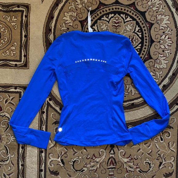 Lululemon Ventilated MeshBack Running Long Sleeve
Blazer Tone Blue - size 2 - Picture 7 of 7